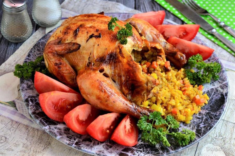 Курица целиком с рисом в духовке